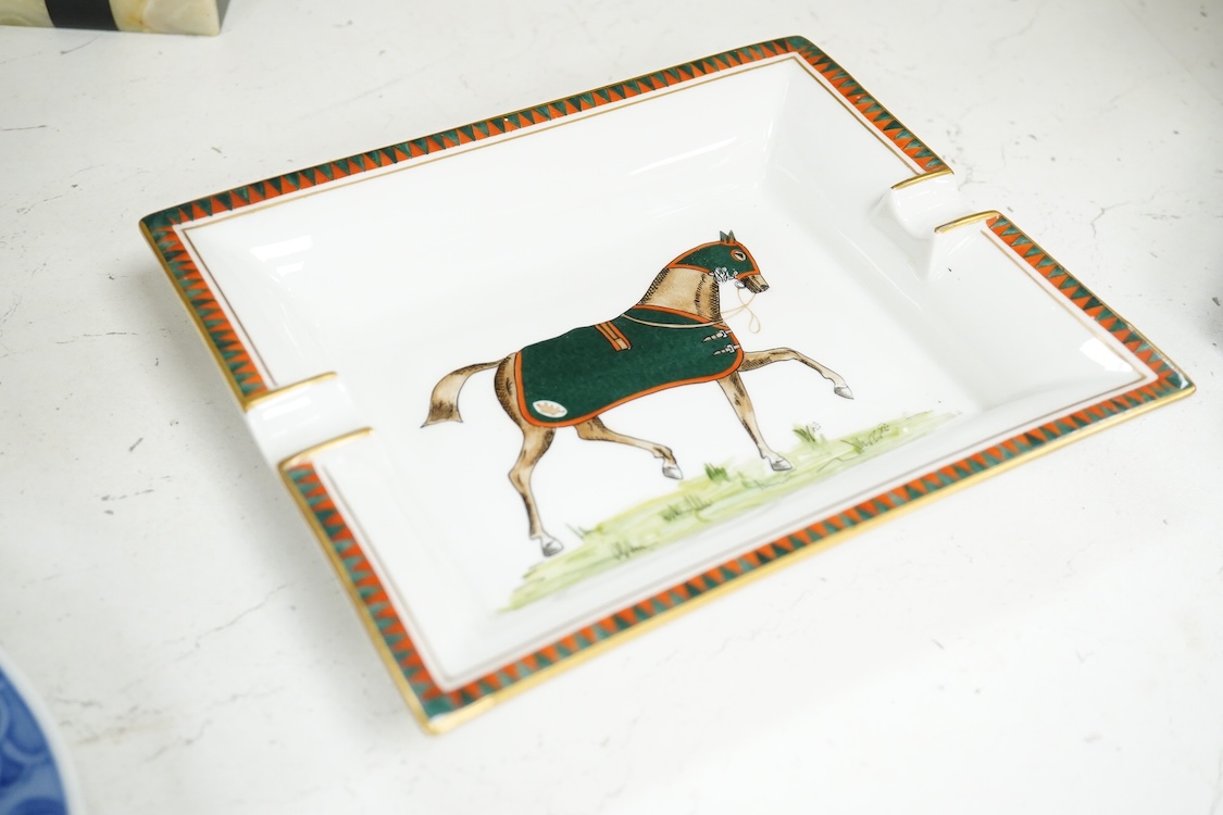 A Hermes porcelain ashtray decorated with a racehorse, 19cm wide